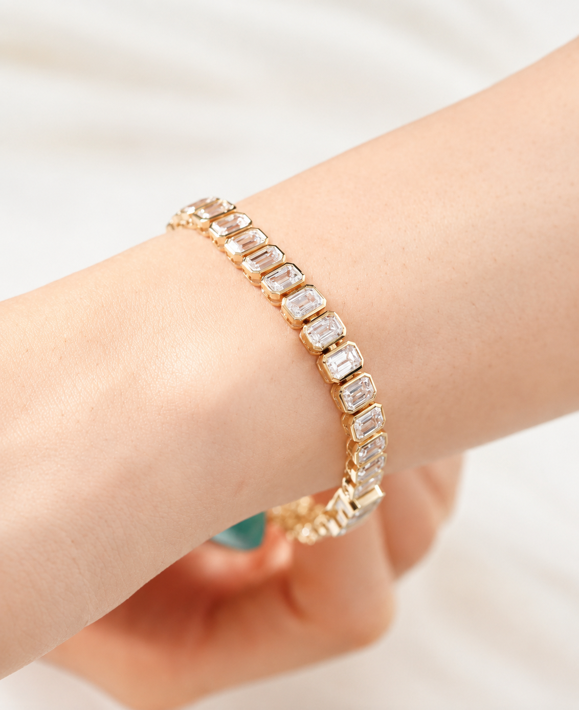 Bracelet tennis diamants taille émeraude – 11 ct total